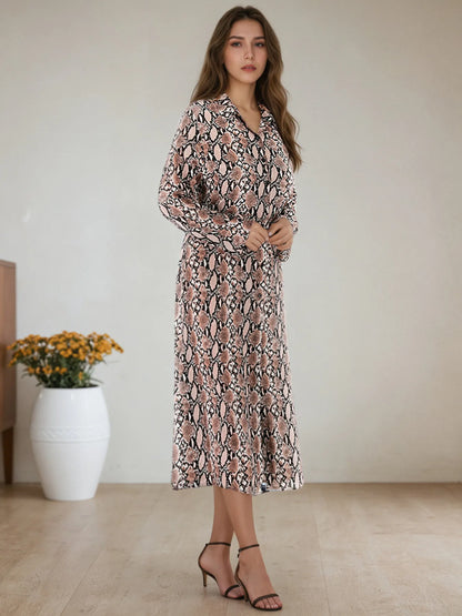 Lifestyle image of Snake Print Shirt Dress worn outdoors, showcasing trendy long sleeve design for women in 2025.